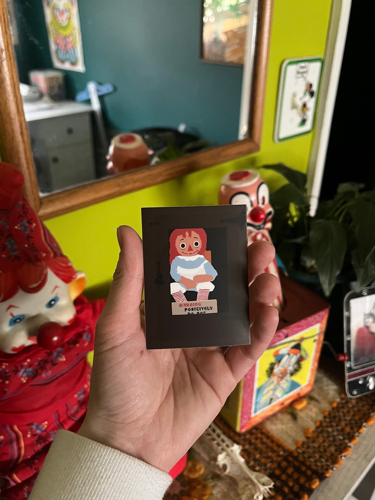 Annabelle in Her Case Sticker